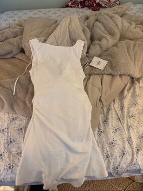 White Sleeveless dress with low back